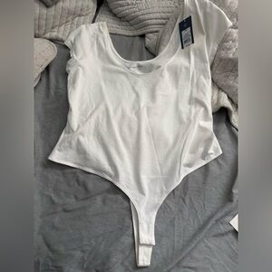 white thong bodysuit